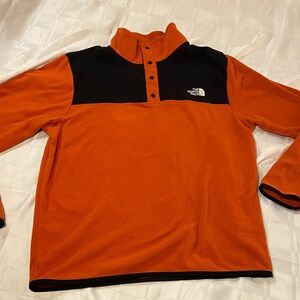 The North Face Bold Orange and Black Fleece Top